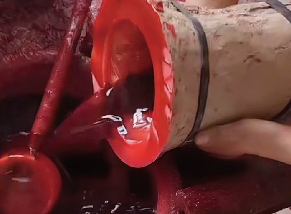 Silicone mold being filled with wax at Wensculp foundry