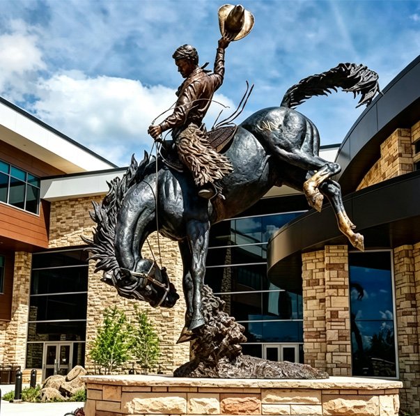 Large bespoke bronze Western Cowboy statue with museum-quality visual effect and UV protection