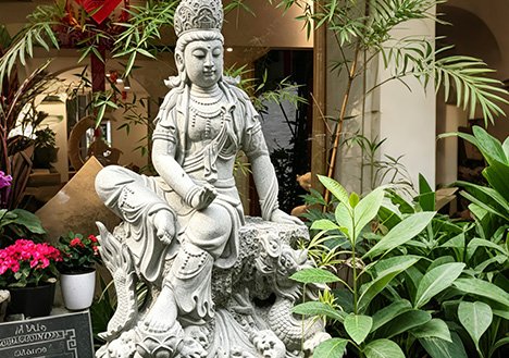 Hand-carved white marble Bodhisattva statue as a premium example of our Custom Stone Sculptures for traditional temple ornamentation and sacred landscape stonework.