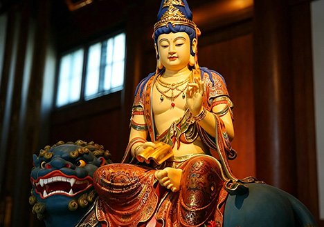 Intricately detailed Custom Fiberglass Sculptures of a polychromatic sacred icon for religious venues, offering a cost-effective solution with high aesthetic fidelity.