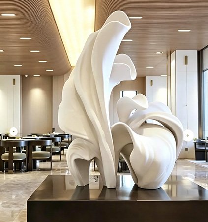 Abstract white organic sculpture in a luxury hotel lounge, backed by our comprehensive After-Sales Support including maintenance protocols and long-term warranties.