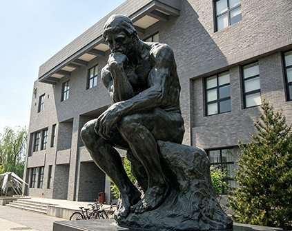 A Realistic Figurative Sculptures of the Thinker serving as an Iconic Campus Landmark Installations, demonstrating Wensculp's tailored Educational Institution Applications for universities and libraries.