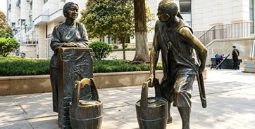 “Carrying Water” – Bronze Sculpture – Located in the Riverside Area of Hankou, Wuhan, Hubei Province