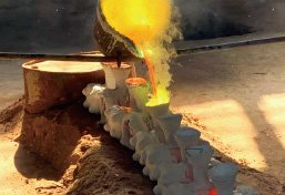 Molten bronze pouring at Wensculp's in-house foundry using premium 88% tin bronze material for maximum structural integrity.