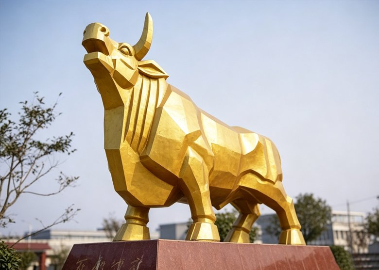 Completed Golden Bull forged bronze sculpture with gold fluorocarbon finish, installed outdoors in Huangshi, Hubei — Winsun Sculpture, 2011