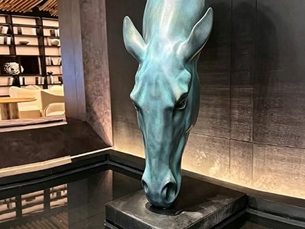 teal fiberglass horse head sculpture