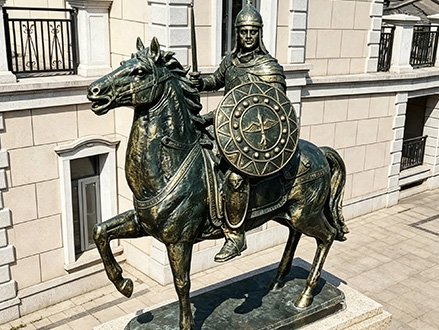 bronze fiberglass horse and armored rider statue