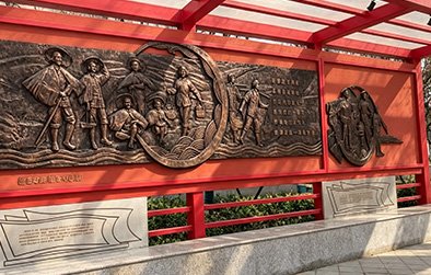 Monumental bronze wall relief mural for public space